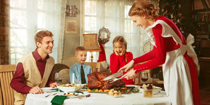 Family having a thanksgiving dinner together, 50s retro style