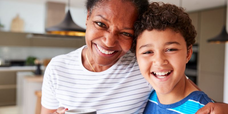 grandmother and grandchild smiling
