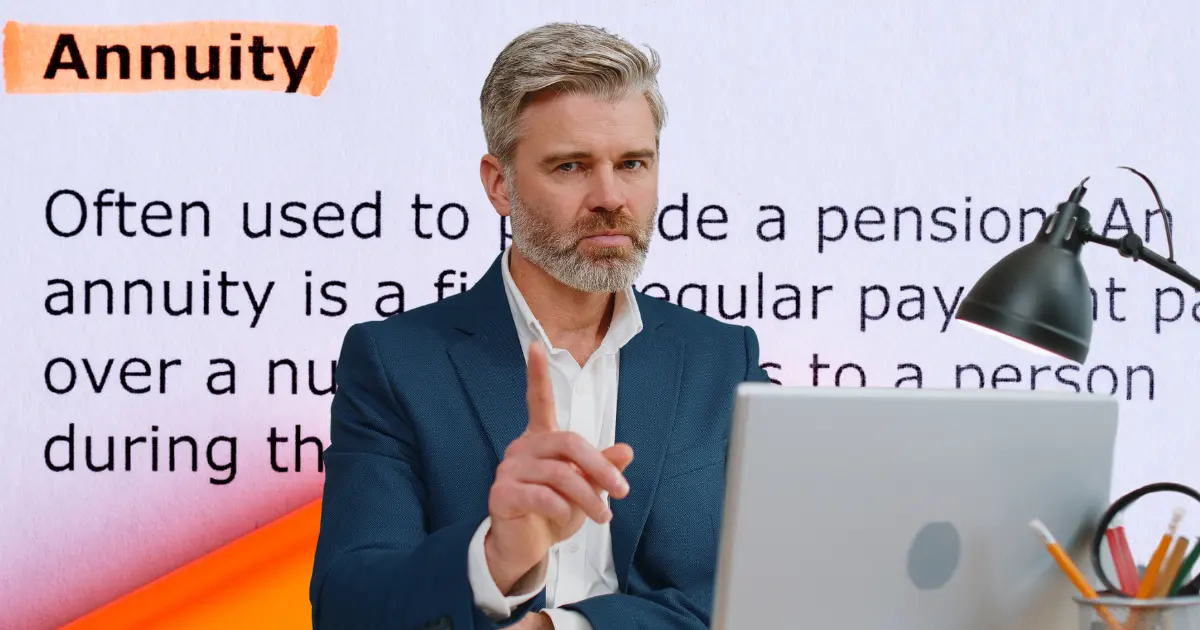 retirement planning man sitting in front of a computer and the definition of annuity but with one hand up gesturing no