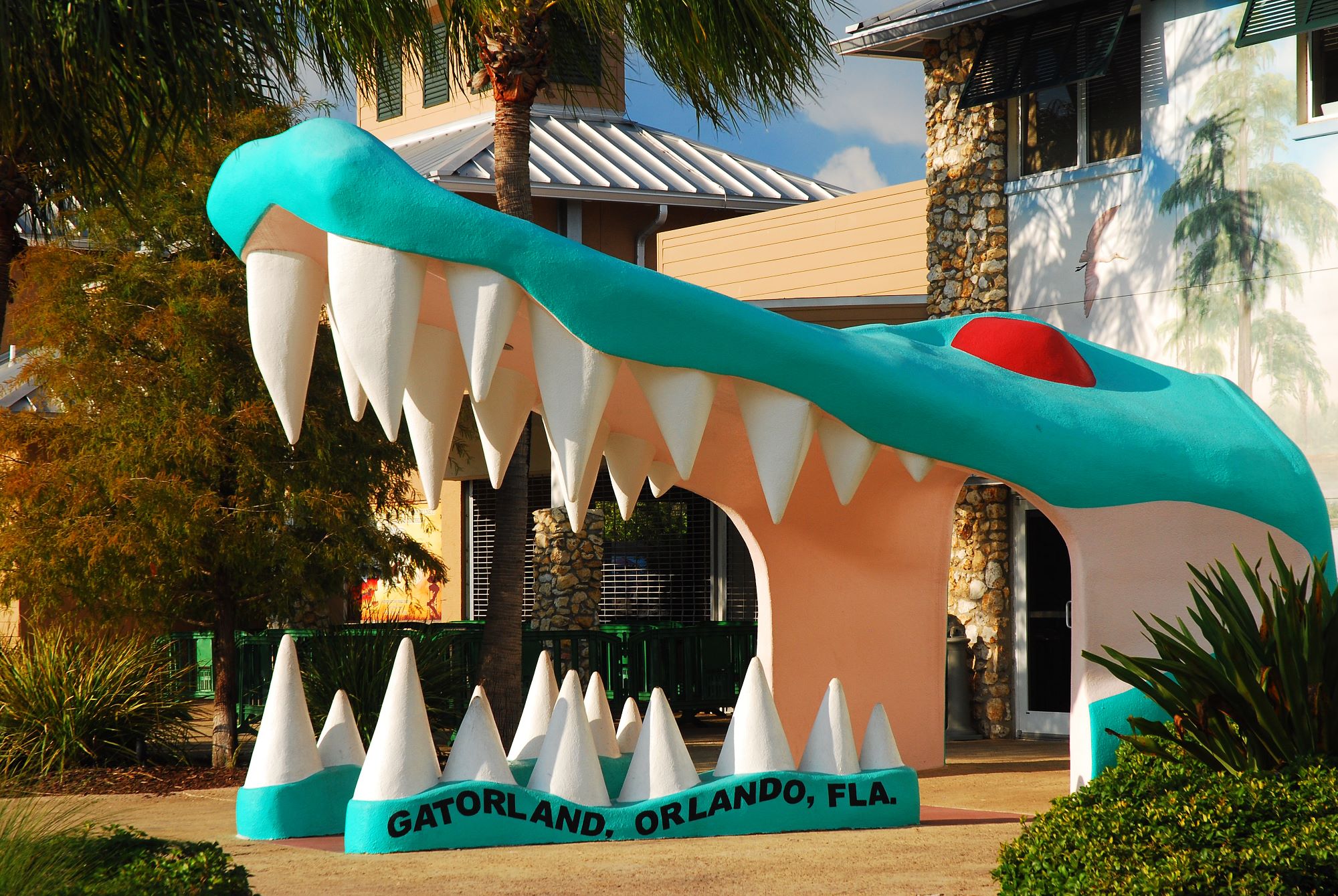 Orlando, FL, USA. A large alligator head marks the entrance to Gatorland, a tourist attraction in Orlando, Florida; Image Credit, Shutterstock