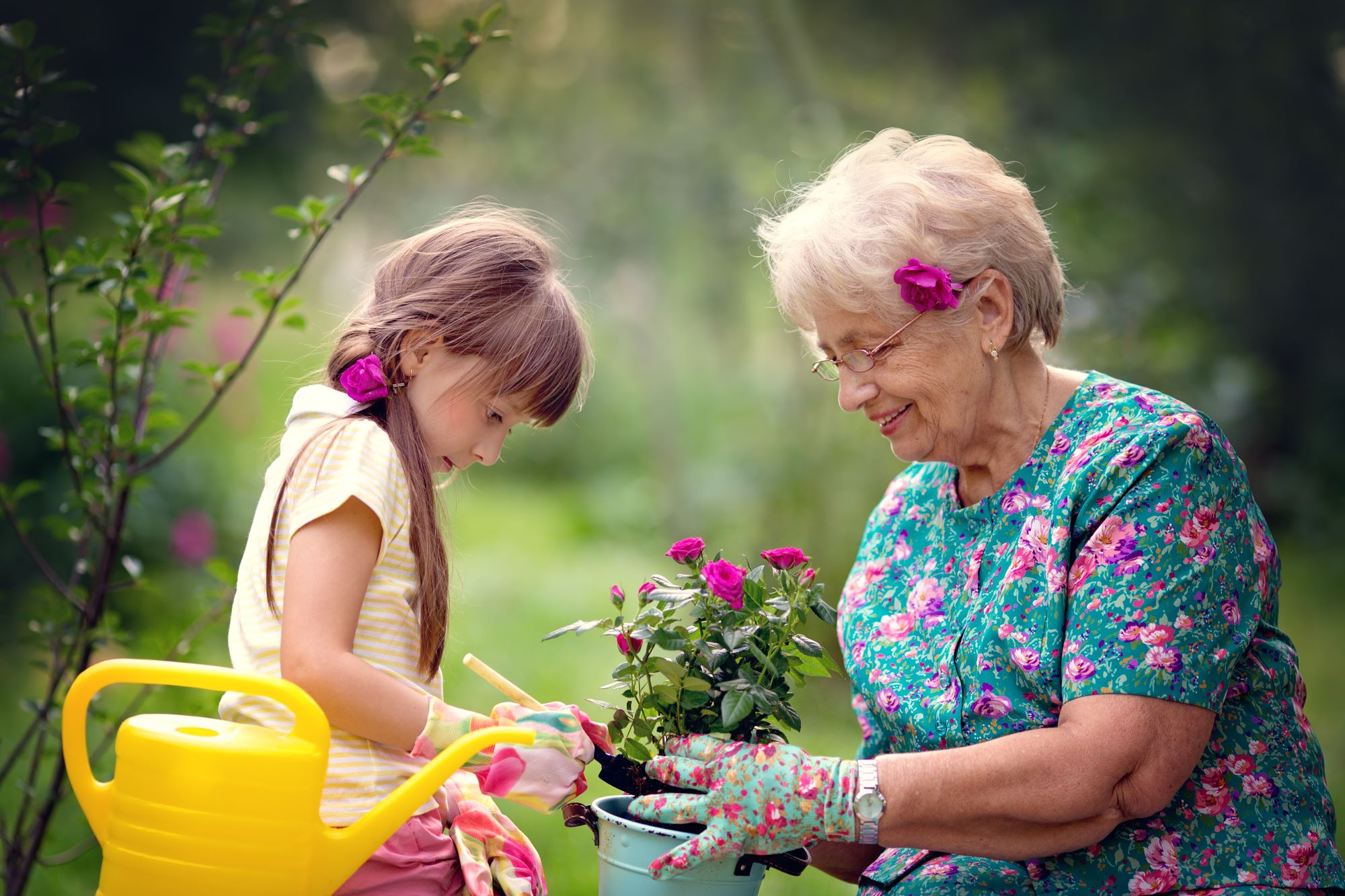 gardening with grandma and granddaughter