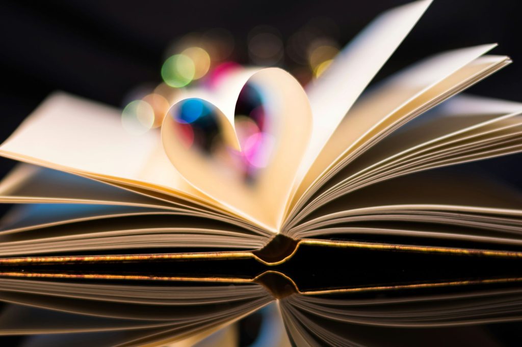 heart pages with a book