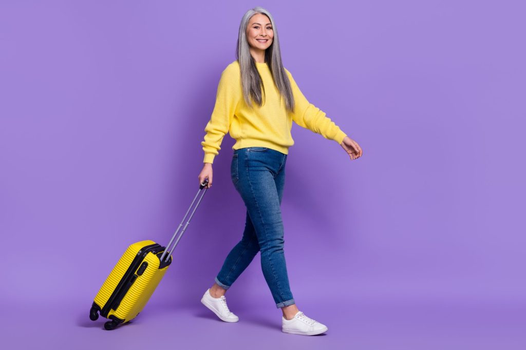lady with yellow suitcase
