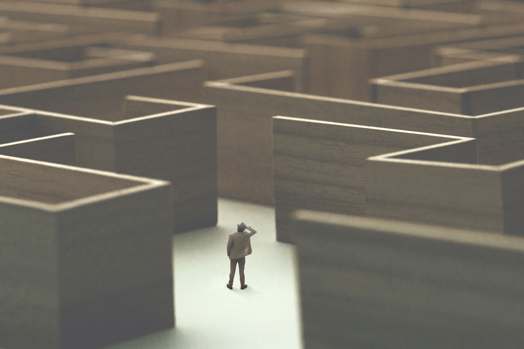 man standing in a very large maze of Medicare, lost