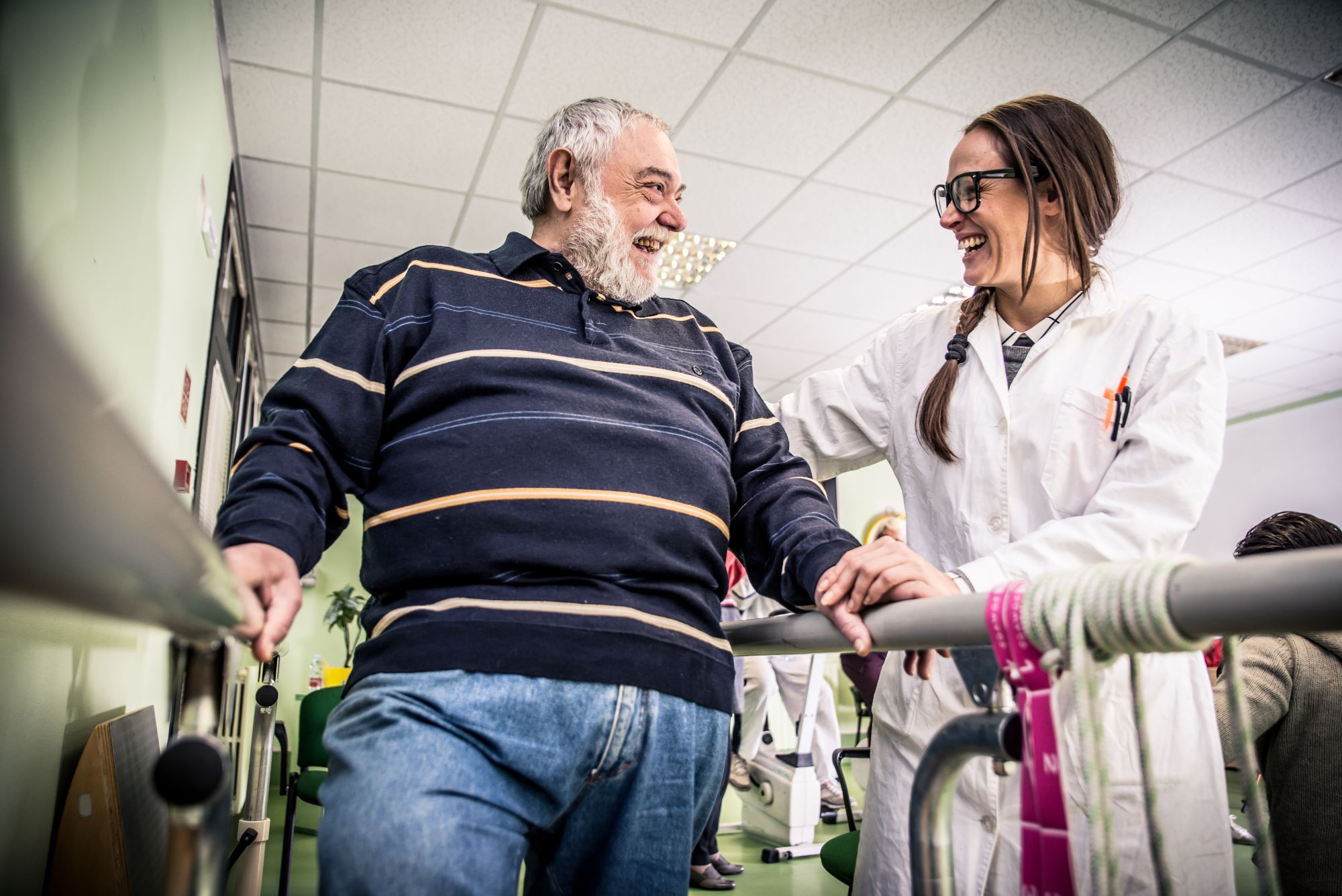 physical therapy senior adult man and health professional