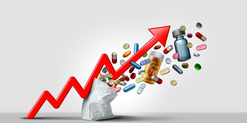 rising cost of pills illustration with a giant red line pointing upward ovver a bag of pills and other prescription drugs exploding