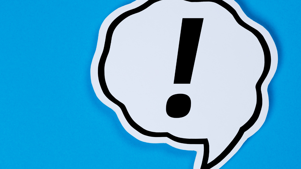 exclamation mark on blue background
