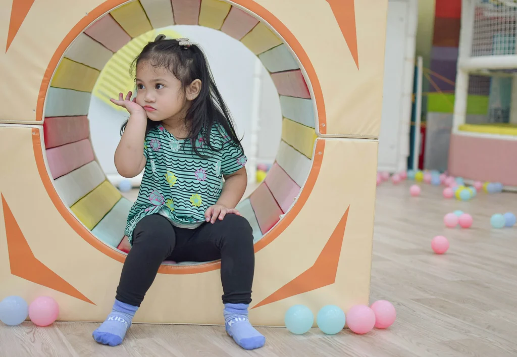 Child in indorr play area