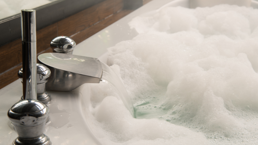 bathtub filled with bubbles