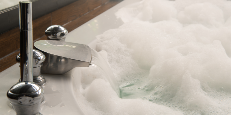 bathtub filled with bubbles