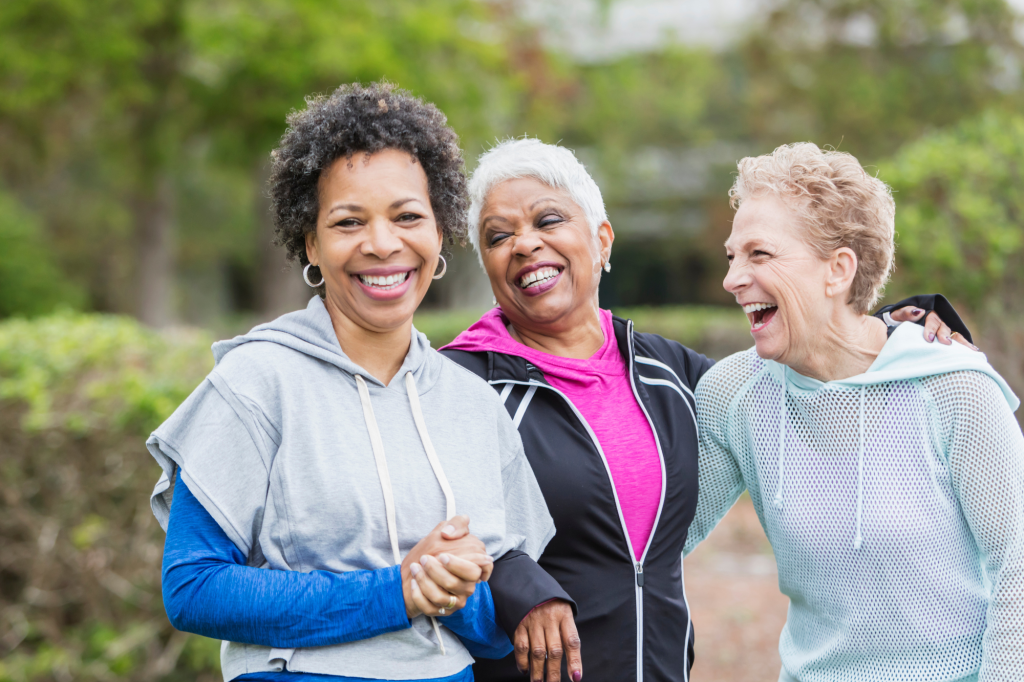 group of older adults exercising, friends, laughter, healthy living
