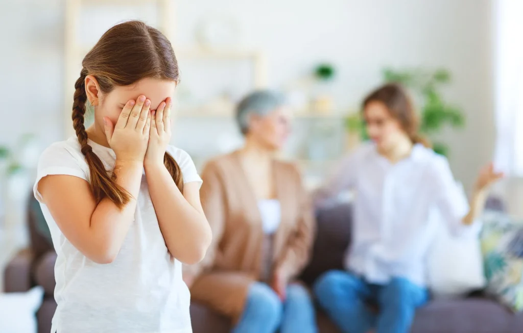 conflict of family three generations angry mother and grandmother scolding a naughty child, grandchild feelings hurt