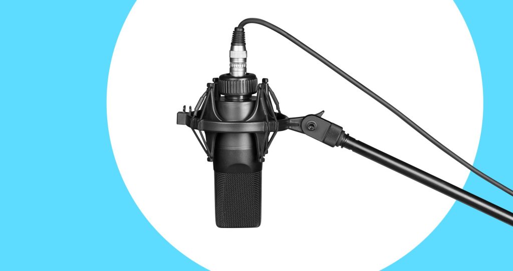 podcast microphone microphone on white and blue background with clipping path