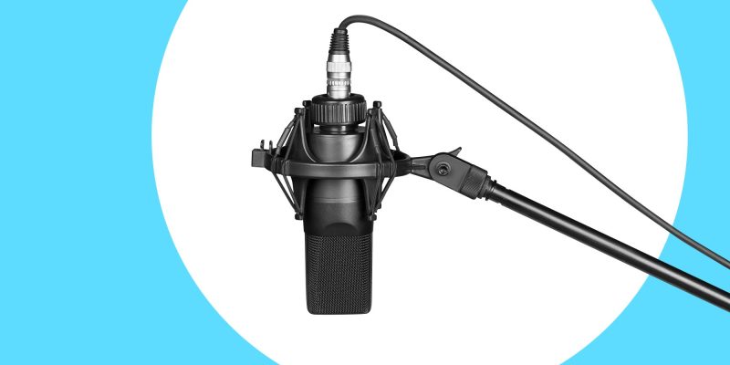 podcast microphone microphone on white and blue background with clipping path