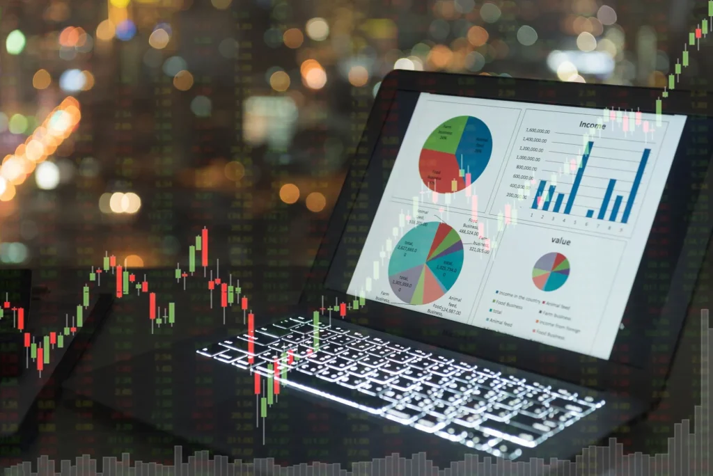investment portfolio on screen laptop computer with index stock market and chart with uptrend stock market graph