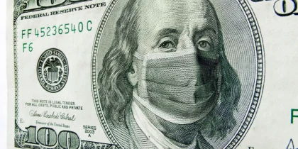 photo illustration of Ben Franklin wearing a healthcare surgical mask on a one hundred dollar bill
