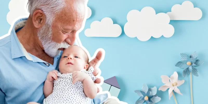 new grandparent kissing new baby on head