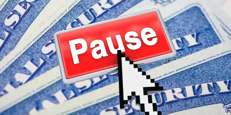social security cards background, with a large red pause button and a mouse arrow clicking it