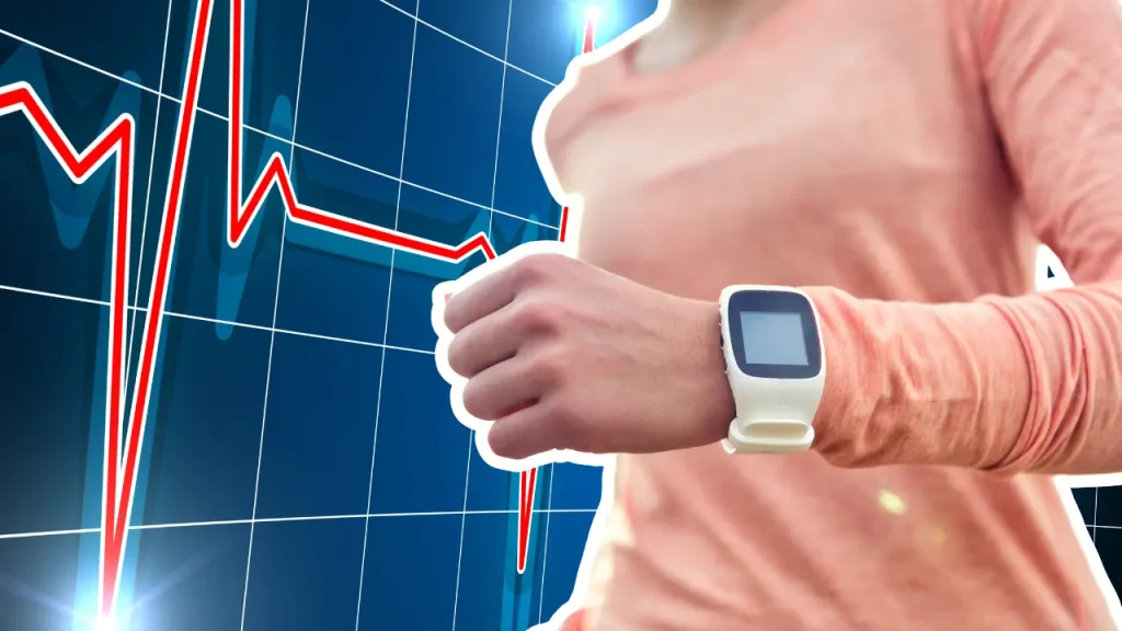 smartwatch close up with a heart rate monitor in the background