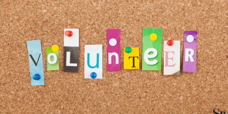 volunteer letters on a cork board