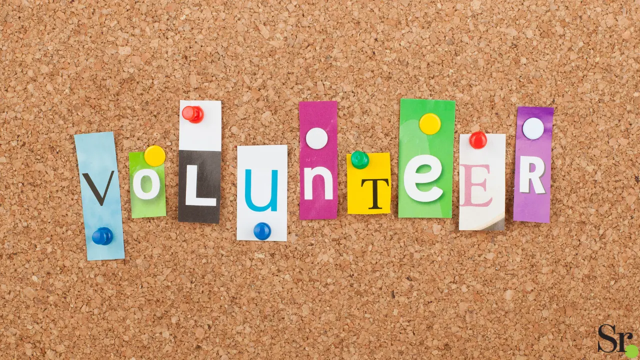 volunteer letters on a cork board