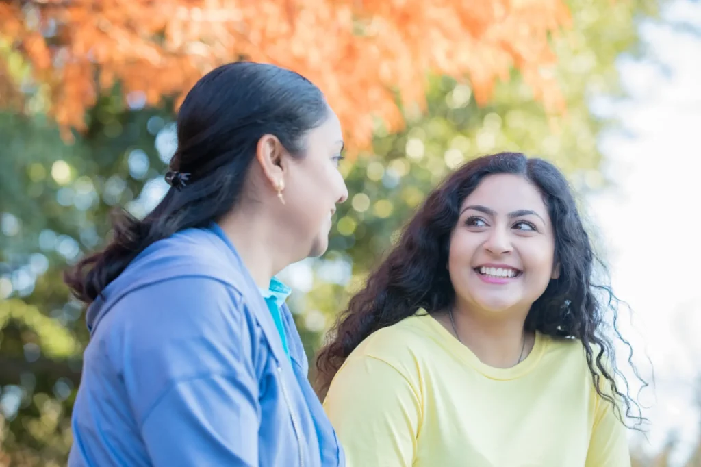 older woman mentoring younger woman