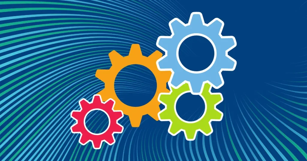colorful gears on a blue wavy background symbolzing something's inner workings