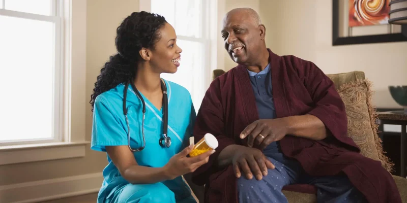 nurse with elderly patient