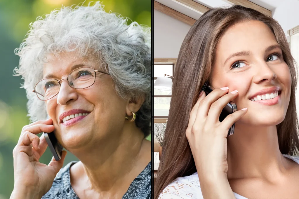 senior woman and younger woman chatting on a cell phone