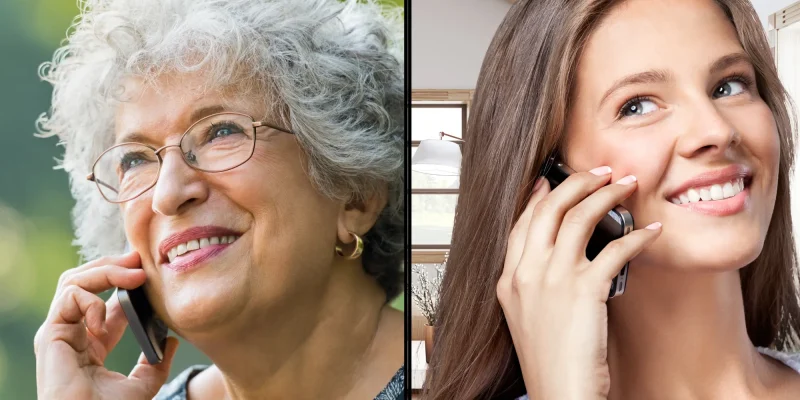 senior woman and younger woman chatting on a cell phone