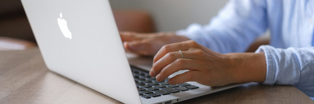 hands typing on a computer Image Credit, Shutterstock