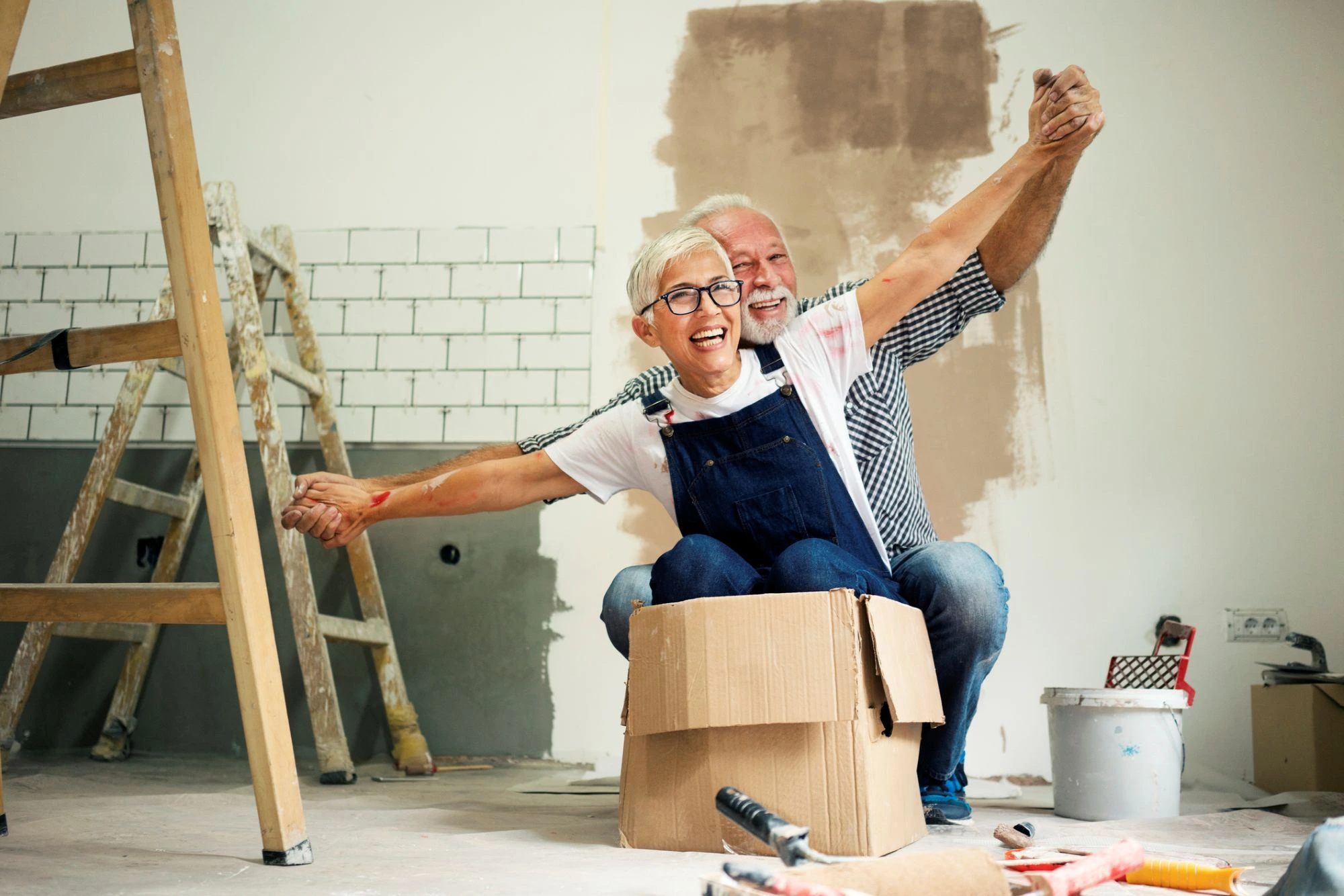 couple redecorating to each other