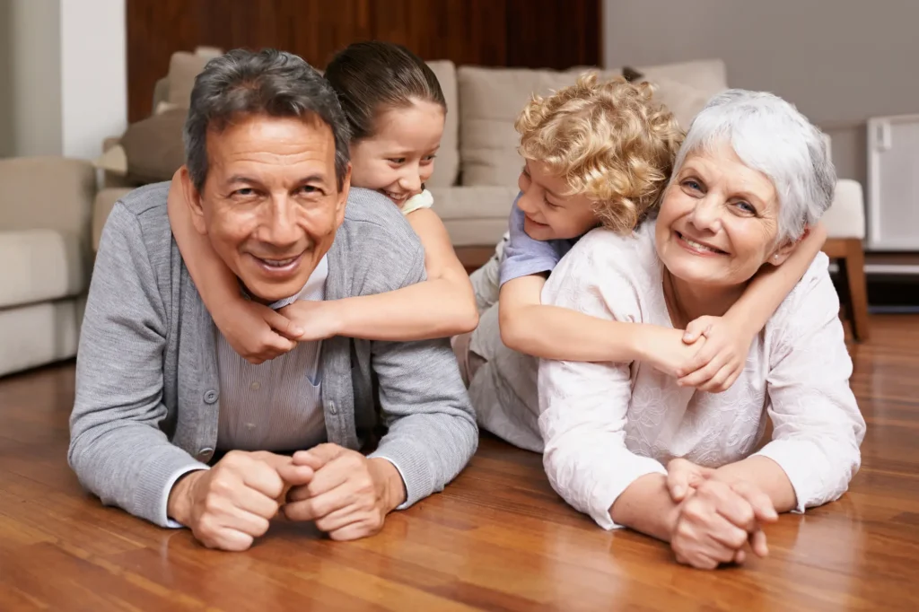 hugging grandkids on floor