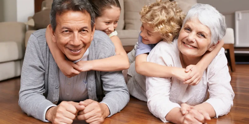 hugging grandkids on floor