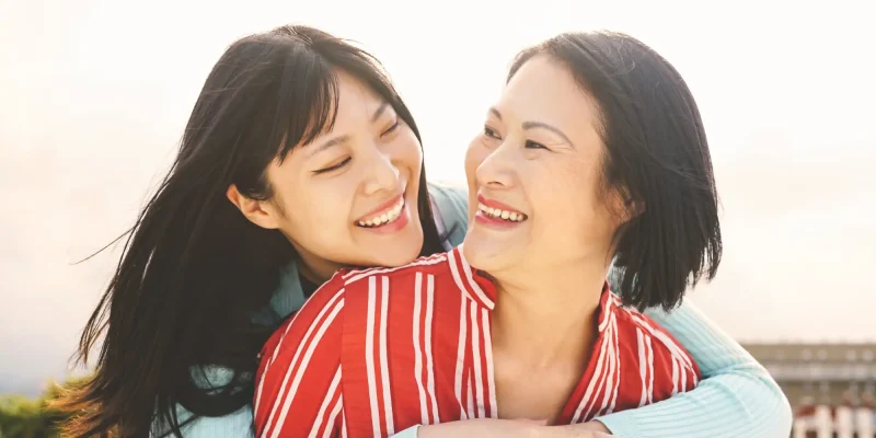mom and daughter hugging