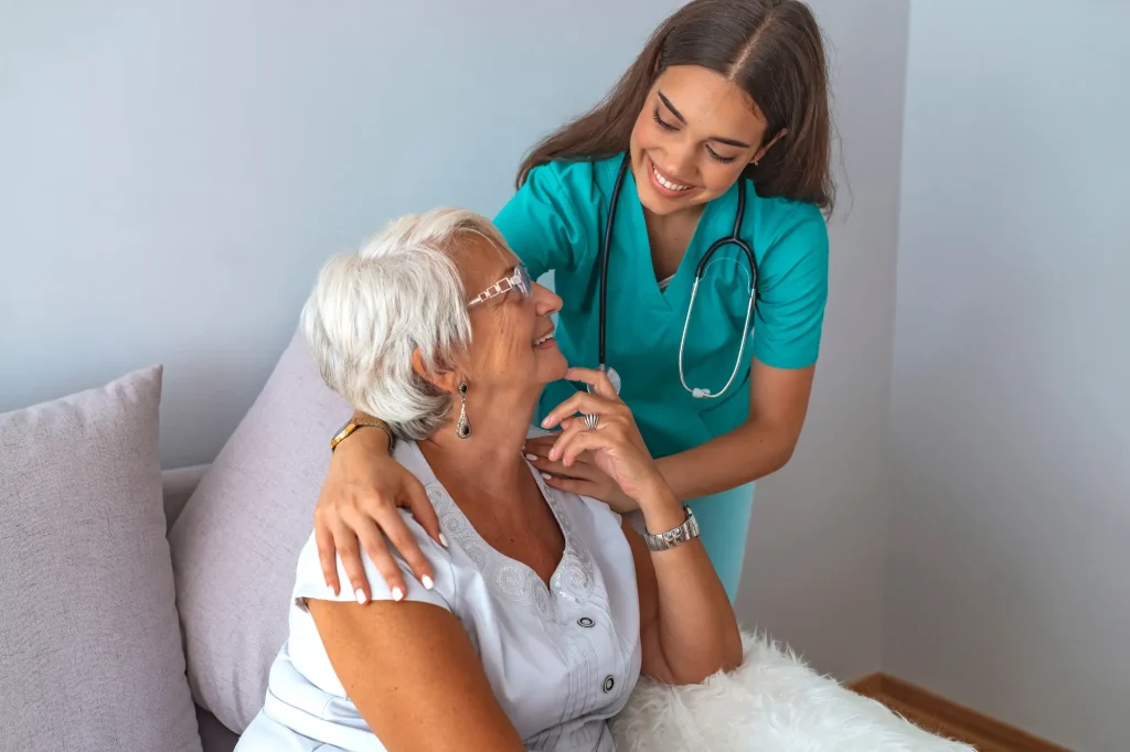 lady and nurse smiling assisted living