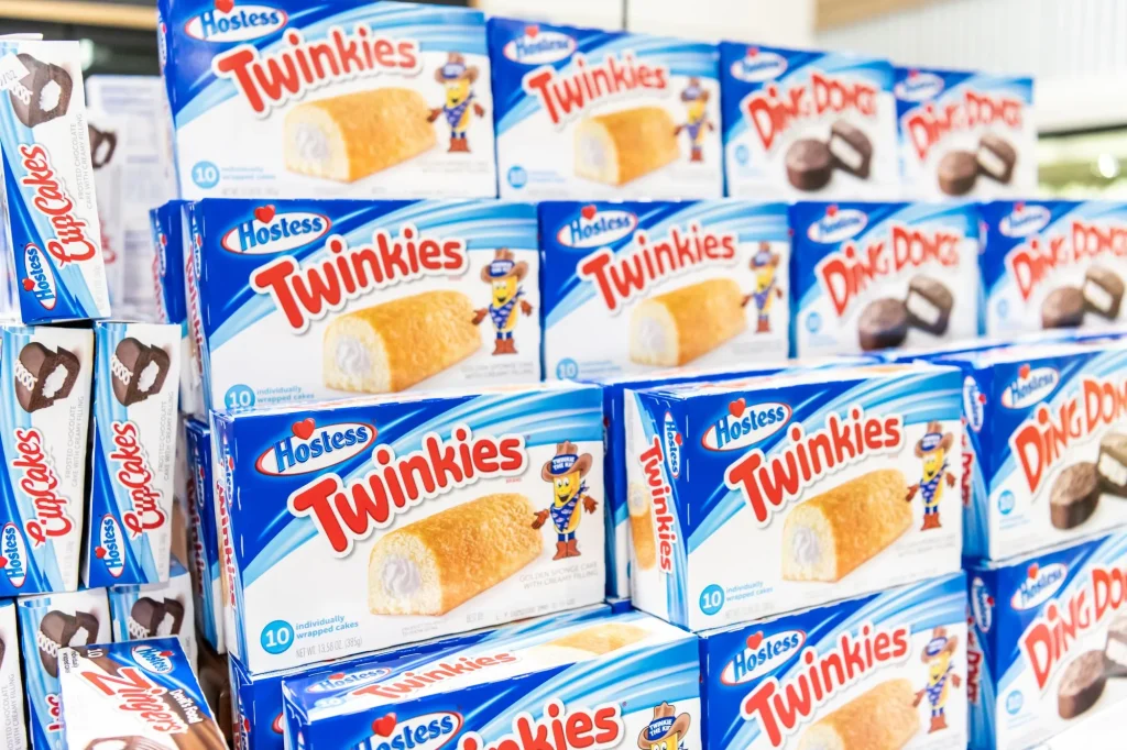 Los Angeles, CA/USA 4/10/2019 Pile of boxes of Twinkies brand cakes for sale at a supermarket aisle, shelf life of twinkies