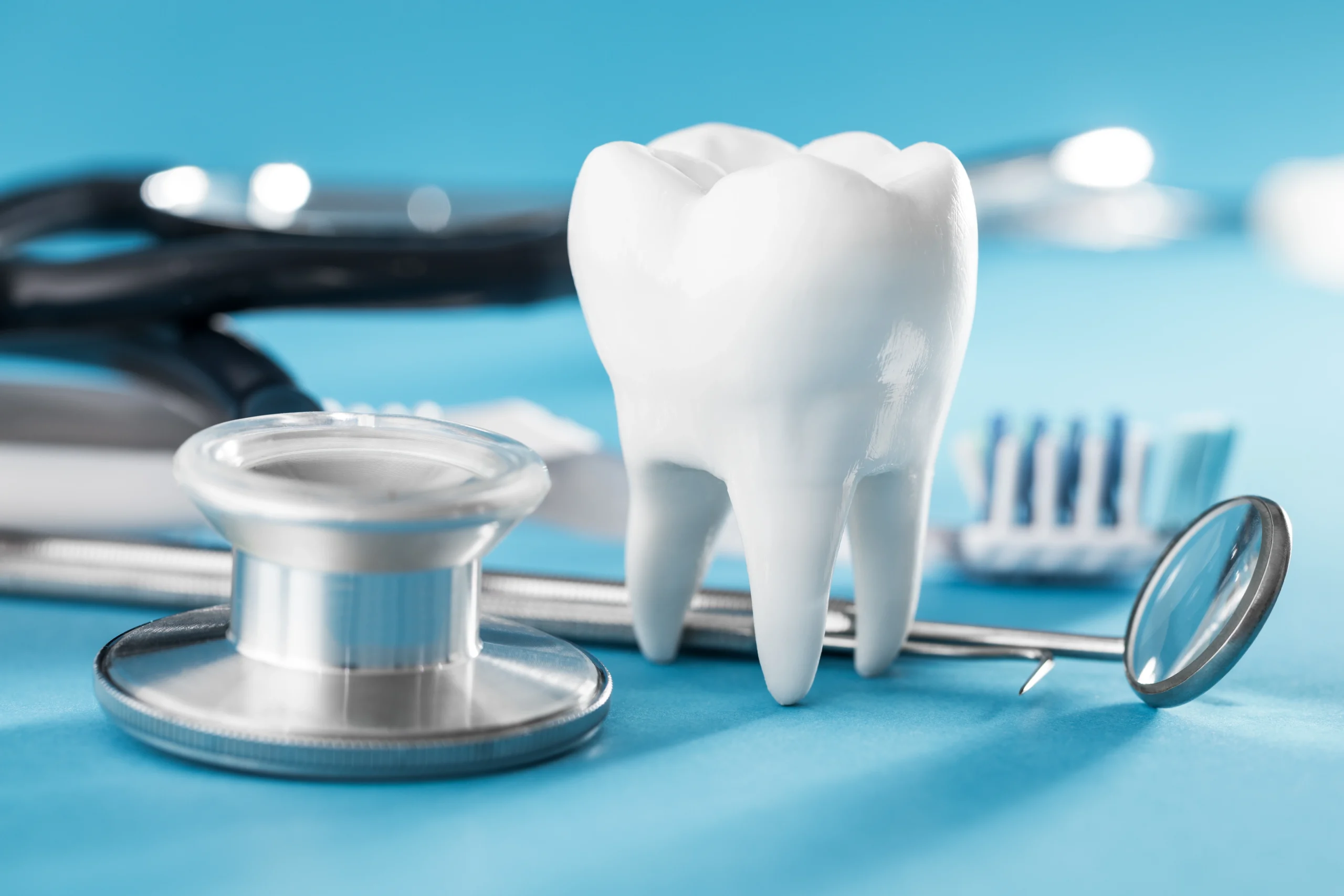 White healthy tooth, different tools for dental care Dental background