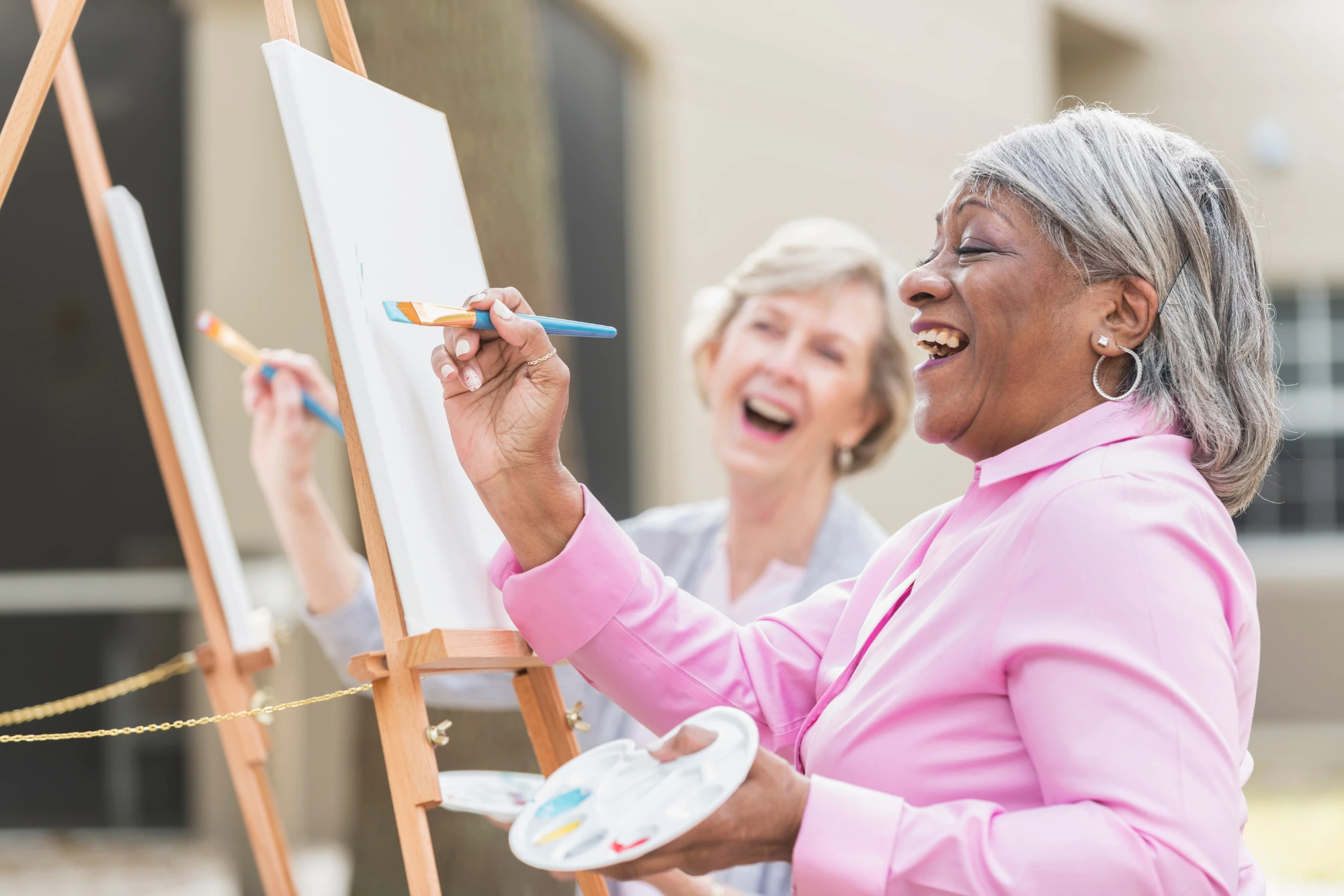 older adults, seniors, having fun painting