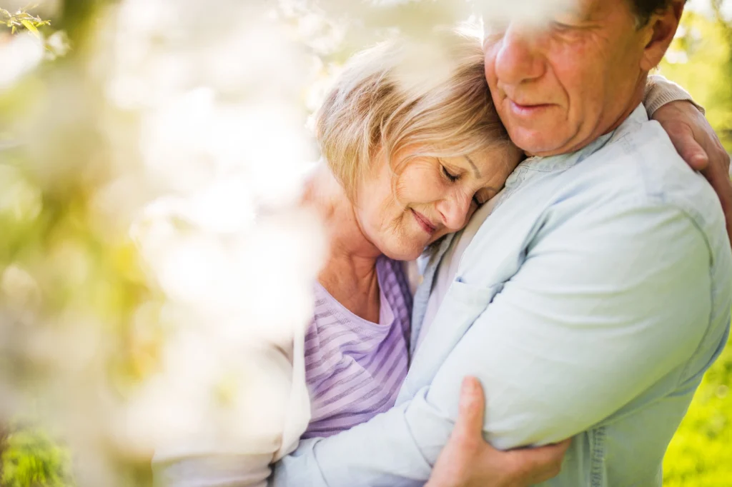 older couple hugging