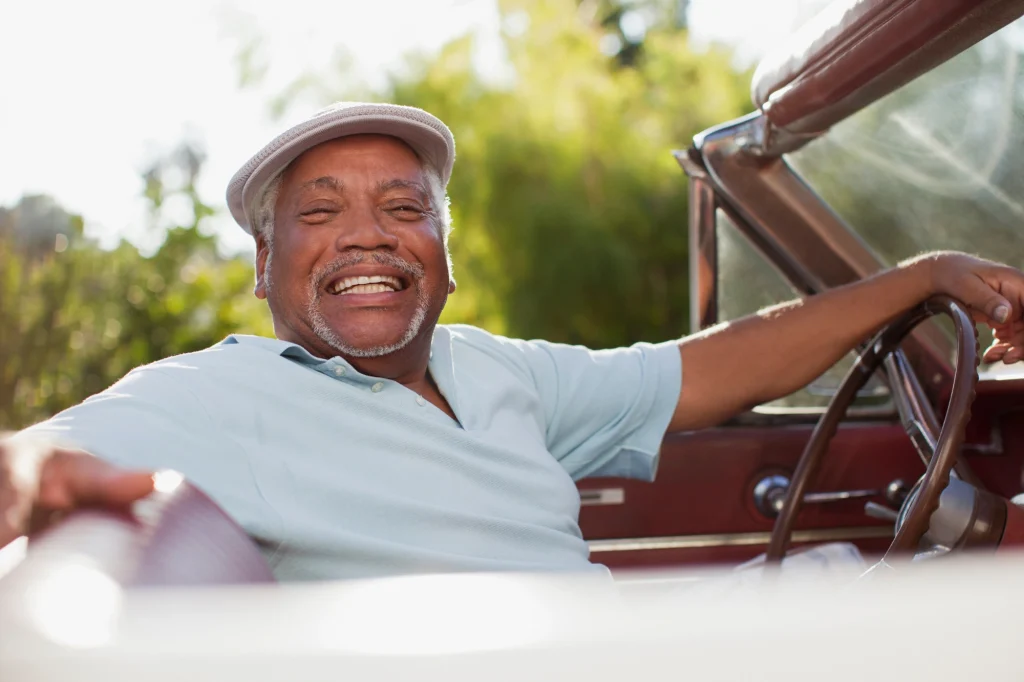 man in car