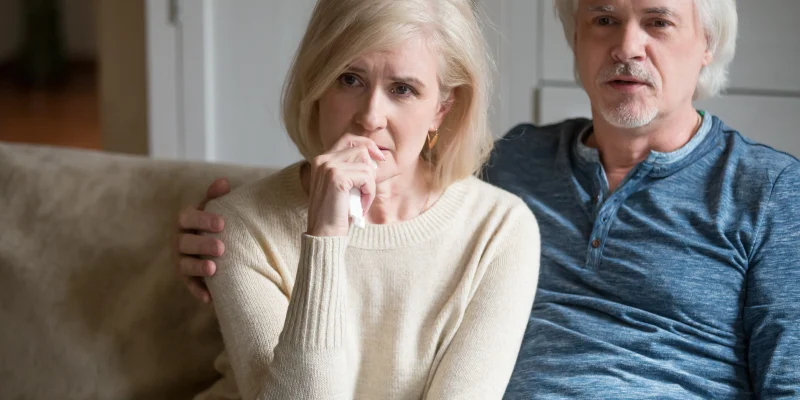Emotional senior husband and wife