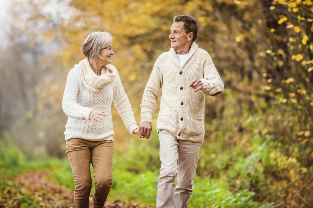 couple walking outside in the fall