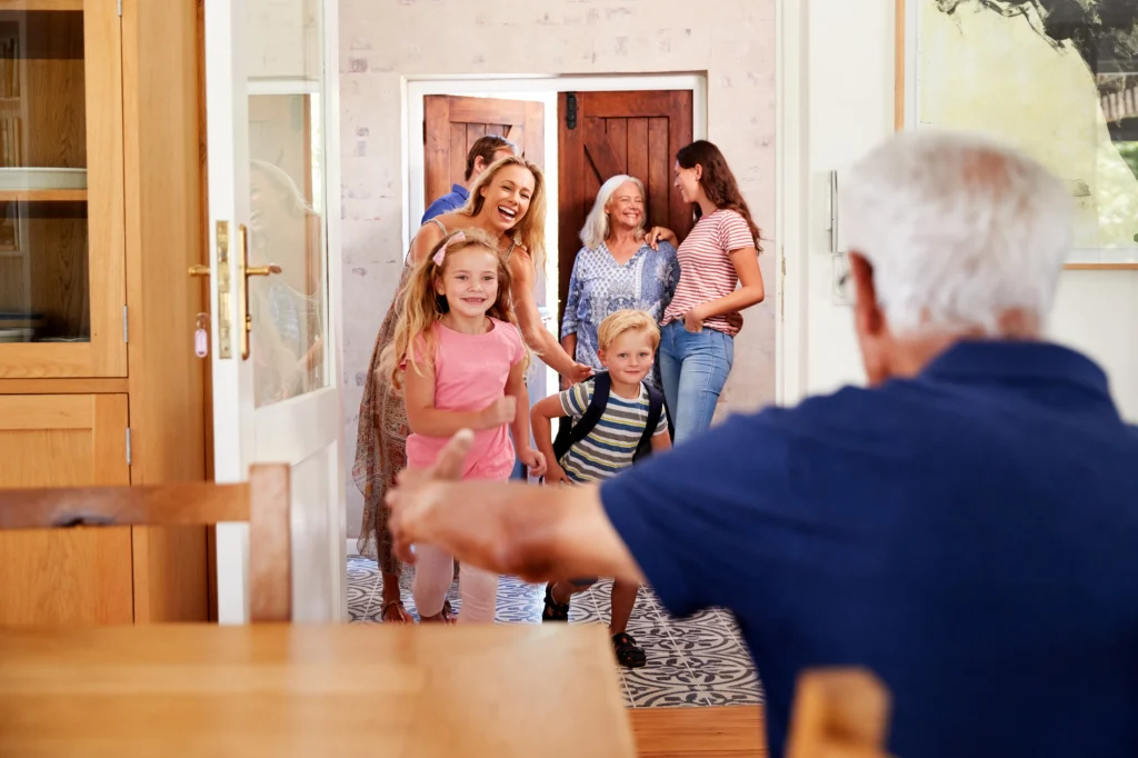 grandkids running to hug grandpa