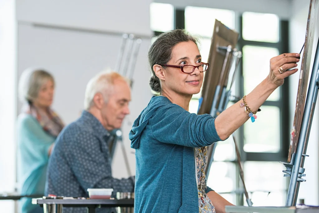 a lady painting art class