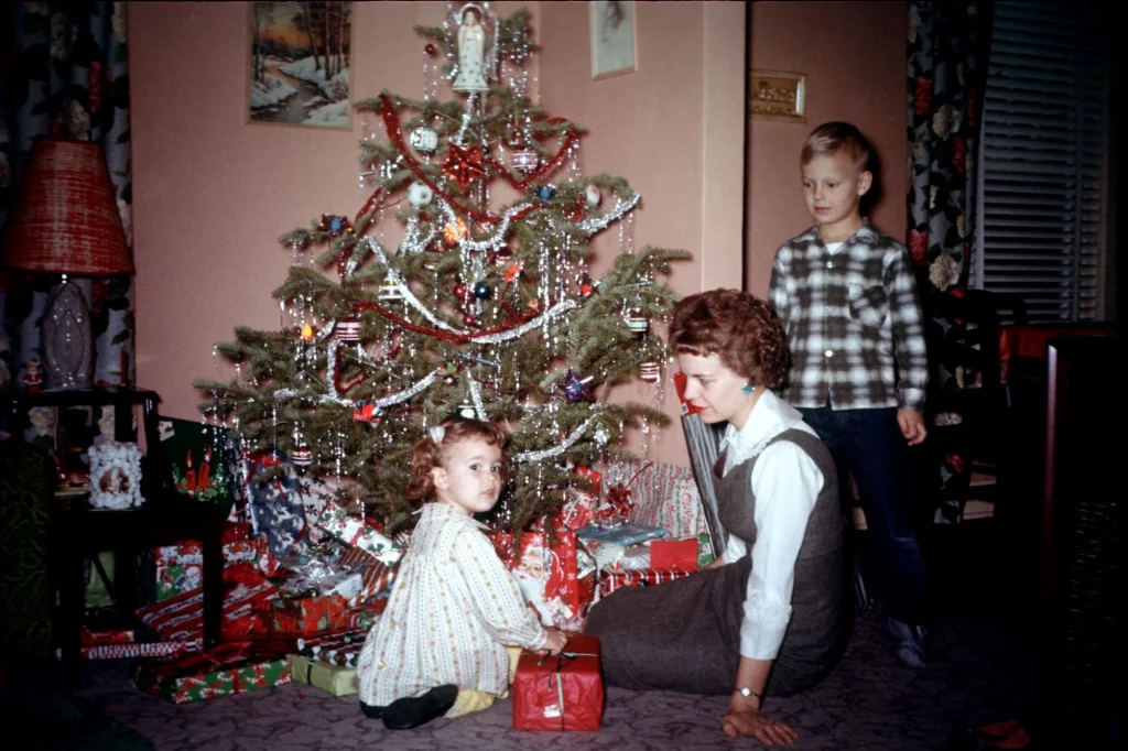 mom opening presents with her kids