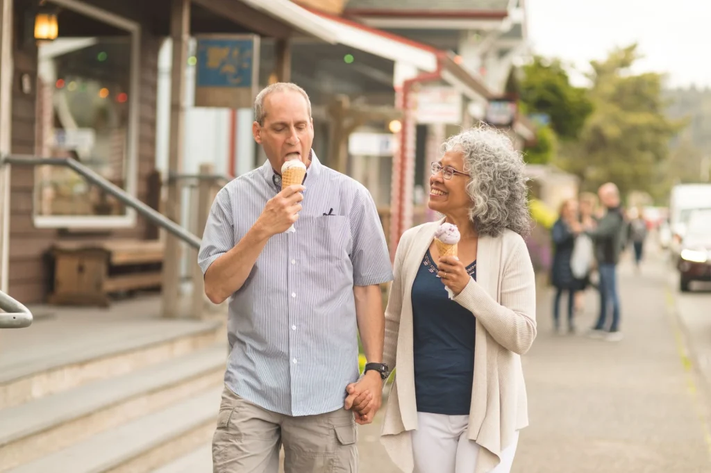 couple eating ice cream outdoors - happy marriage