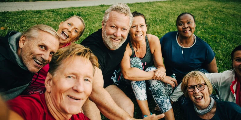 older senior friends selfie outdoors