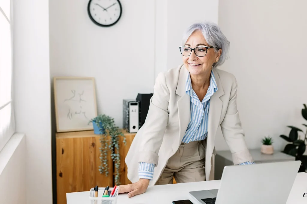 older lady working at laptop