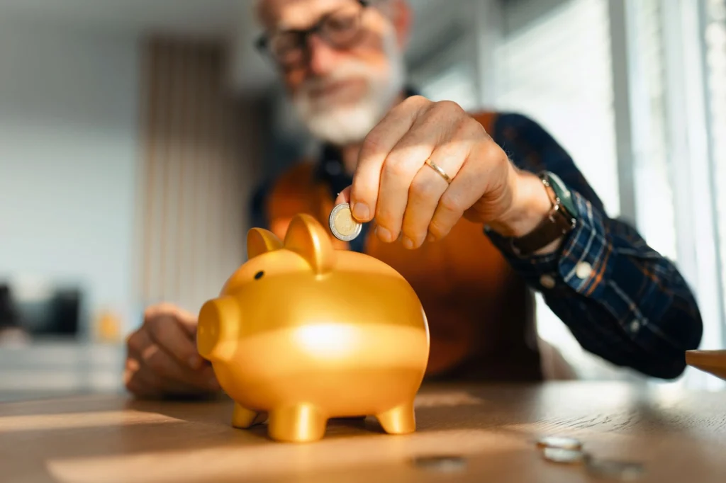 coin in orange piggy bank